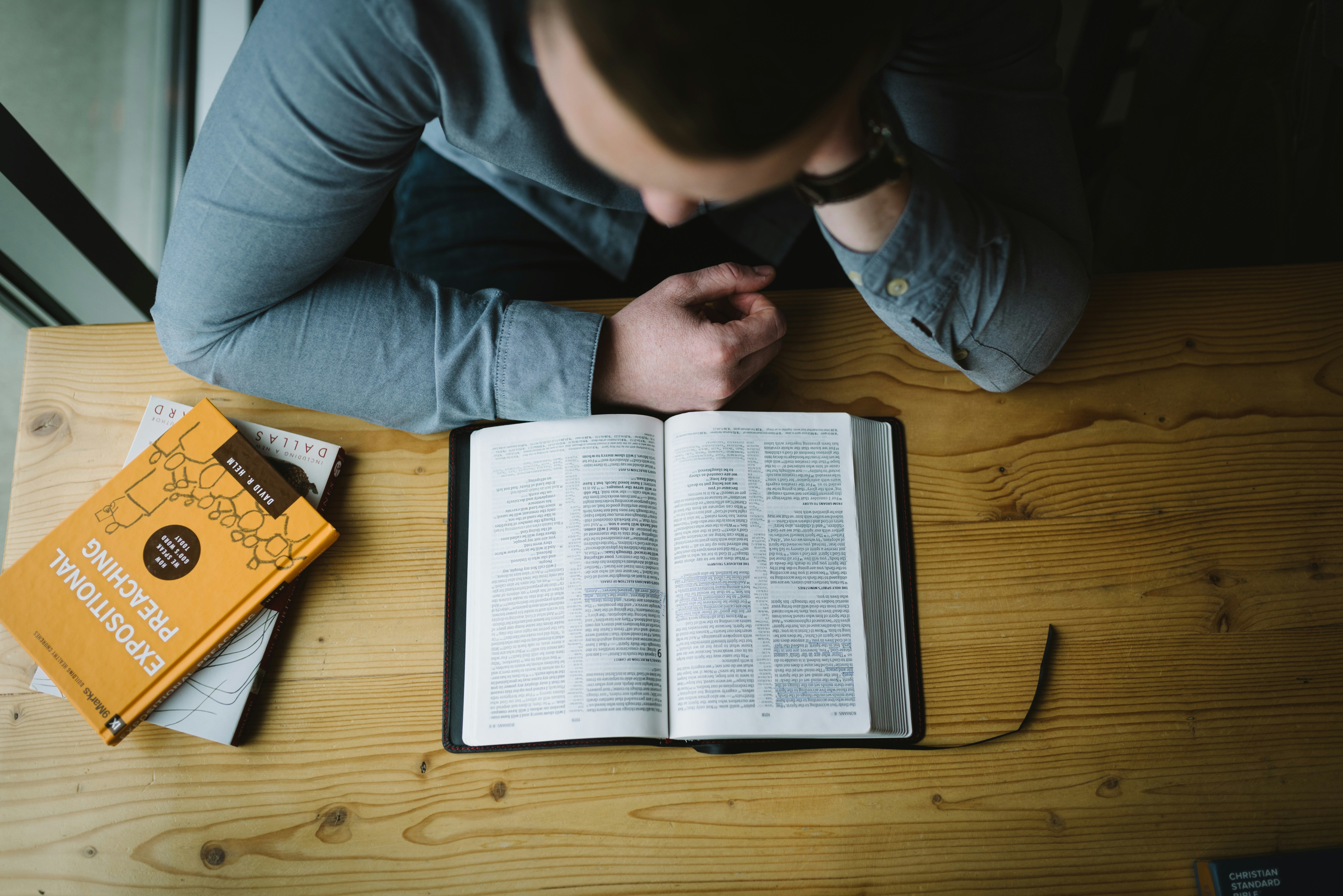 Person Reading a Bible